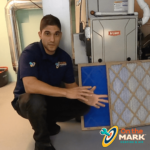 changing air filter as part of furnace maintenance